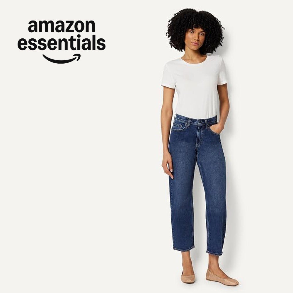 Amazon Essentials logo beside a woman in a white tee and cropped jeans wearing the ballet flat